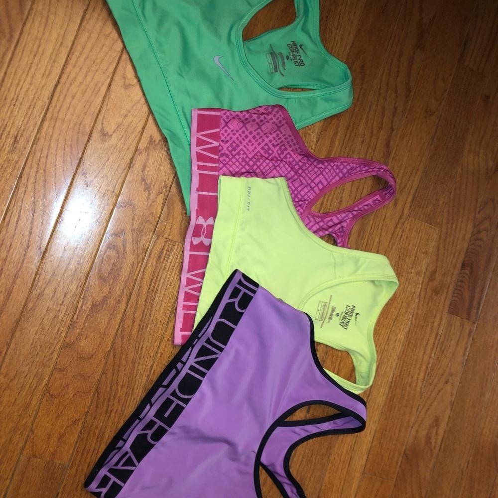 Pack of Nike and Underarmour sports bras